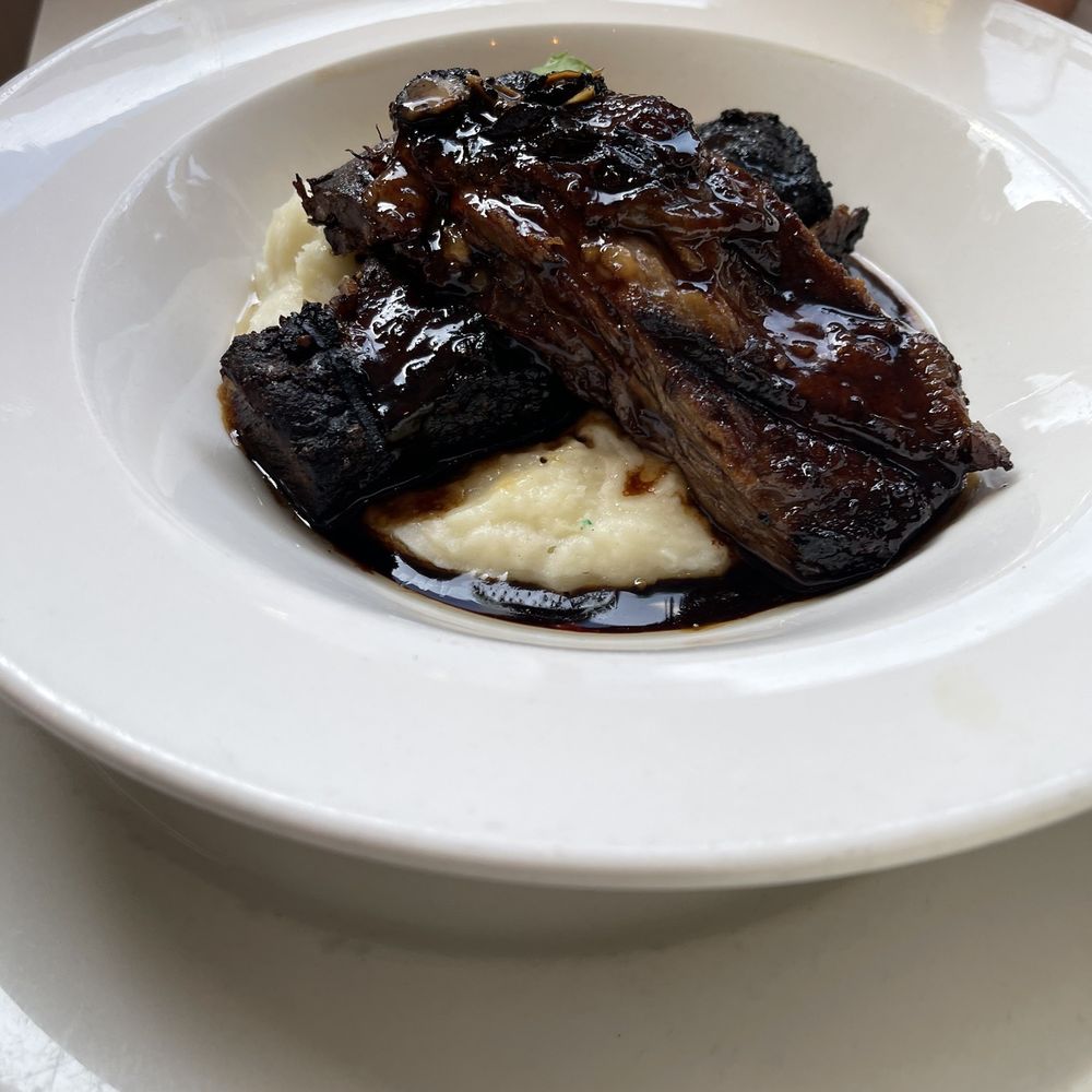44 & X Hell's Kitchen - grilled braised short ribs, manchego mashed potatoes, black truffle port wine reduction - New American Near Me - New York, New York