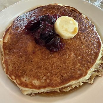June's - Pancakes with cherries and butter - Breakfast & Brunch Near Me - Austin, Texas