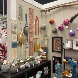 Handmade Art. Kbp Designs (booth E24). 15% sale running through Jan. 1.  Wool felting, macrame, printmaking, gnomes, and more....