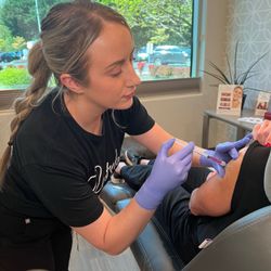 Evolve Aesthetics & Wellness - BTS of Lindsey administering a B12 shot!
