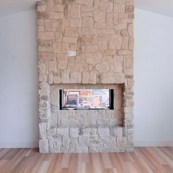 Dm Construction Group - Rustic stone double-sided fireplace as a centerpiece in this modern Chelan home. By DM Construction Group. - General Contractors Near Me - Maple Valley, Washington