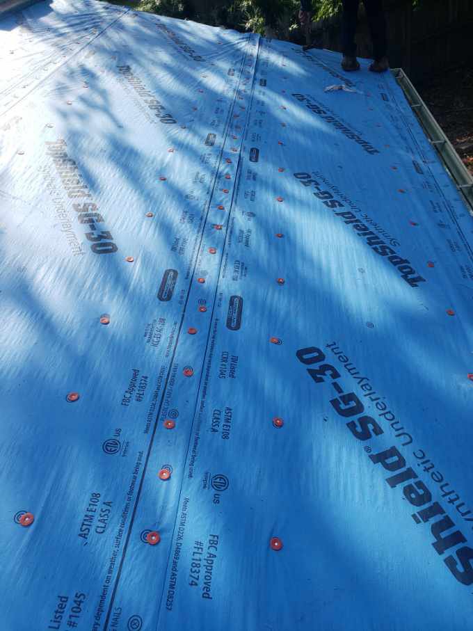 Slide of Dacoma Roofing