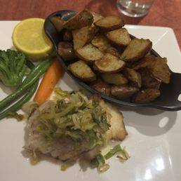 Sautéed Icelandic Loin of Cod topped with Leek Fondue in Chardonnay Dill Sauce & side of Rotisserie Potatoes