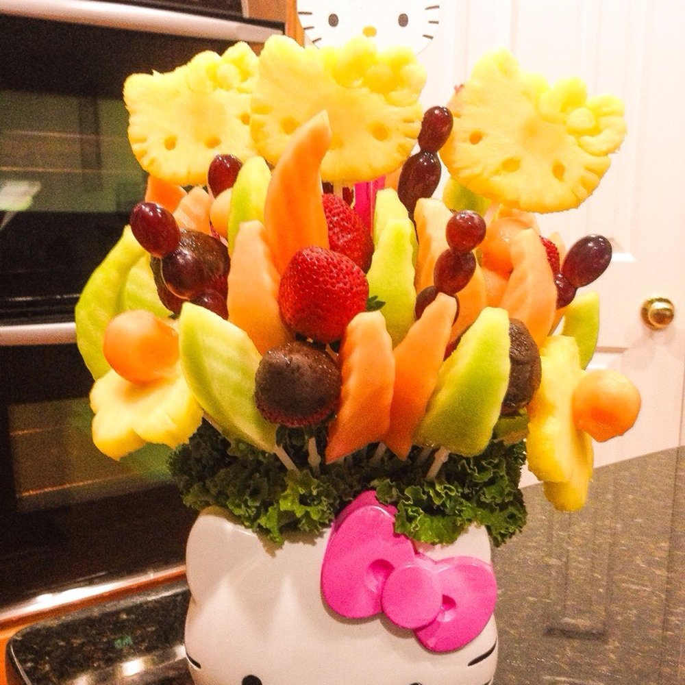 Edible Arrangements - Here's the arrangement with 3 Hello Kitty-shaped pineapples showing. - Florists Near Me - Manassas, Virginia Edible Arrangements - Here's the arrangement with 3 Hello Kitty-shaped pineapples showing. - Florists Near Me - Manassas, Virginia