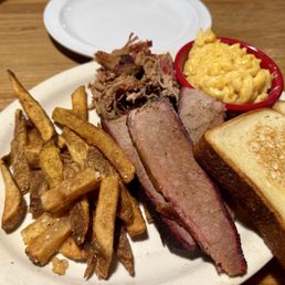 Combo Plate - Awful dry brisket and decent pulled pork. Sides were average too. Combo Plate - Awful dry brisket and decent pulled pork. Sides were average too.