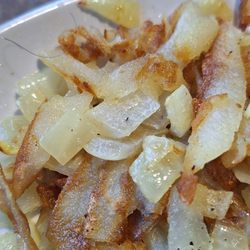 Family House Restaurant - Hashbrowns with onion. I ordered crispy. Those are nt. The o ions.are though