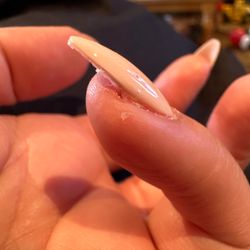 Serenite Nails & Spa - Finger cut by scissors when getting a full set