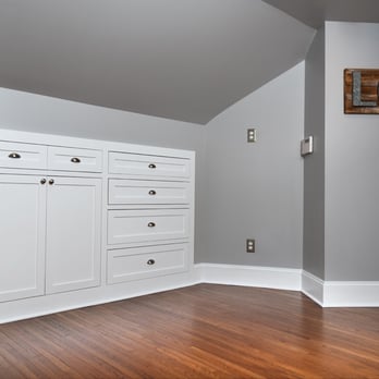 SMC Construction - a room with white cabinets and wood floors - General Contractors Near Me - Spring Lake Park, Minnesota SMC Construction - a room with white cabinets and wood floors - General Contractors Near Me - Spring Lake Park, Minnesota