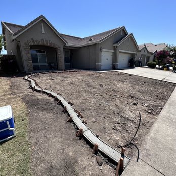 Vazquez Main Landscape - Mow strip is poured and waiting for it to dry and be set - Landscaping Near Me Vazquez Main Landscape - Mow strip is poured and waiting for it to dry and be set - Landscaping Near Me