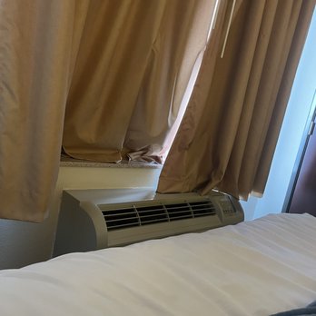 Comfort Suites Jackson-Cape Girardeau - Curtains draped on top of the air conditioner - Hotels Near Me - Jackson, Missouri