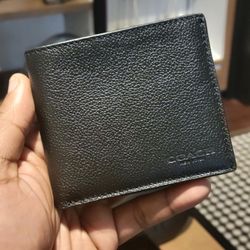 Coach Outlet - Snagged a new wallet to match my bag.
