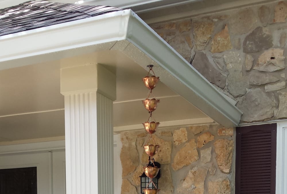 Slide of Custom Solutions Construction & Central Texas Gutters