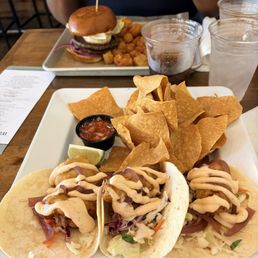 Fish tacos w/gloppy sauce and awful dry chips.