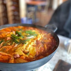 Koreana Korean BBQ - Bu Dae Chi Ghe. Aka the Kimchi Stew mixed with spam, sausage, zucchini, onions, green onions, ramen and cheese