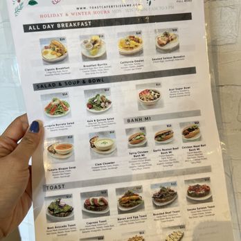 Toast & Thai - a hand holding a menu - Desserts Near Me - El Segundo, California Toast & Thai - a hand holding a menu - Desserts Near Me - El Segundo, California