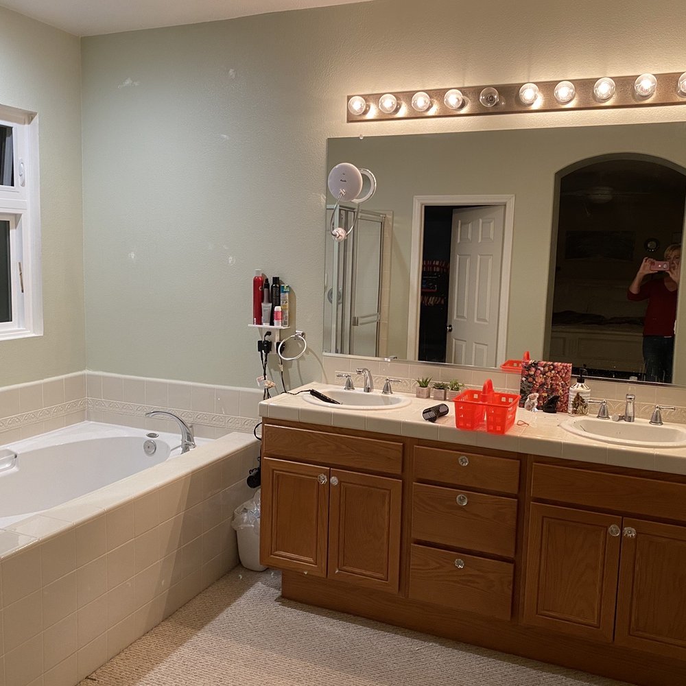 ASR Construction - Original master bathroom, outdated lighting, carpet (?), hulking wood vanity - General Contractors Near Me ASR Construction - Original master bathroom, outdated lighting, carpet (?), hulking wood vanity - General Contractors Near Me