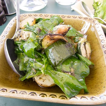 Oaxen Slip - Potato salad with spinach, grilled zucchini and capers - Bistros Near Me - Stockholm, Alberta
