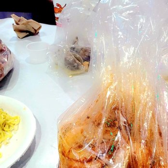 The Kickin' Crab - variety of foods on a table - Cajun/Creole Near Me - Long Beach, California The Kickin' Crab - variety of foods on a table - Cajun/Creole Near Me - Long Beach, California