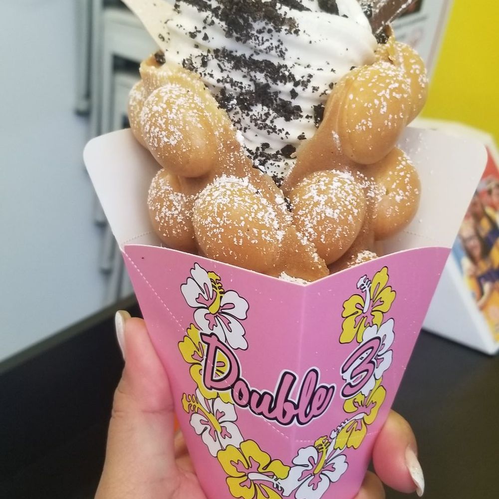 Double Three - Original waffle with vanilla ice cream topped with oreo bits and kit kat. - Ice Cream & Frozen Yogurt Near Me - Honolulu, Hawaii Double Three - Original waffle with vanilla ice cream topped with oreo bits and kit kat. - Ice Cream & Frozen Yogurt Near Me - Honolulu, Hawaii