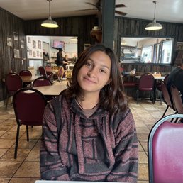 Happy daughter with empty plate