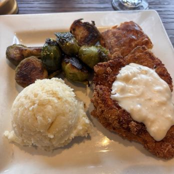Daniel George - Fried Chicken Breast with Brussel sprouts, mashed potatoes, and biscuit - New American Near Me - Mountain Brook, Alabama