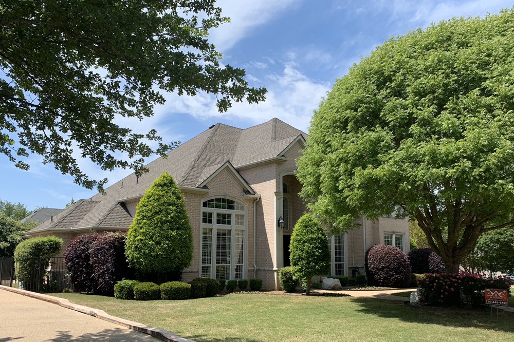 Slide of RE Roofing and Construction