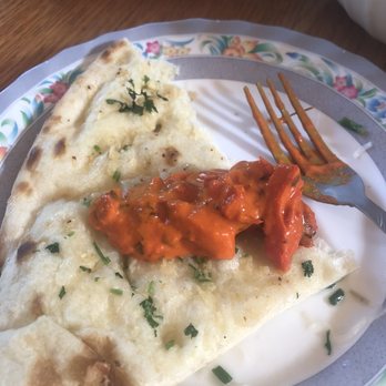Manraj’s Kitchen - Garlic naan w butter chicken - Indian Near Me - Auburn, Washington Manraj’s Kitchen - Garlic naan w butter chicken - Indian Near Me - Auburn, Washington