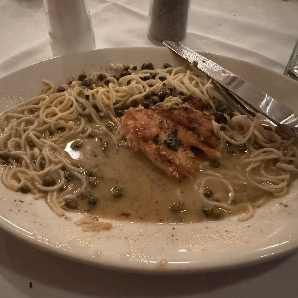 Chicken Picatta after two bites of chicken. Chicken Picatta after two bites of chicken.