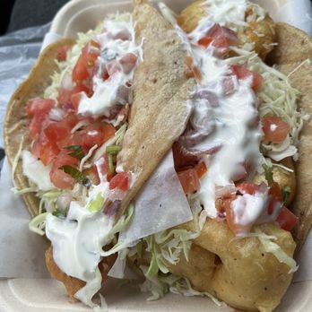 Mariscos German - Fish taco on the left was fine. Shrimp taco on the right was terrific. - Food Trucks Near Me - San Marcos, California