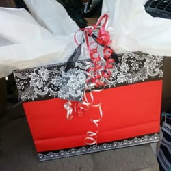 Evelyn's Flowers And Gifts - Gift wrap by the store employee.