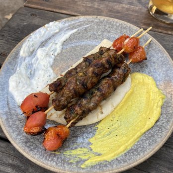 District Kitchen & Cocktails - Moroccan Lamb Kabobs - New American Near Me - Austin, Texas District Kitchen & Cocktails - Moroccan Lamb Kabobs - New American Near Me - Austin, Texas