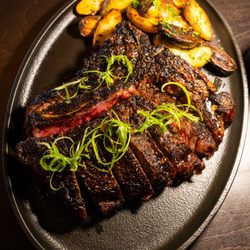 Driven Steakhouse - 12oz. In-house dry aged austrailian silver wagyu NY strip (6-7). Served with duck fat fingerling potatoes