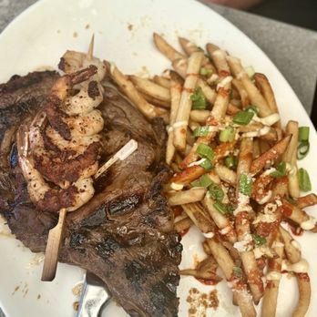 Yard House - Korean Ribeye with grilled shrimp skewer - Bars Near Me - Roseville, California Yard House - Korean Ribeye with grilled shrimp skewer - Bars Near Me - Roseville, California