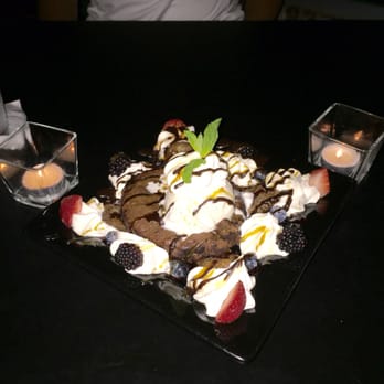 In the Raw Sushi - The chocolate gateau "monkey style". Essentially they add the bananas foster to the chocolate gateau, pretty good stuff! - Sushi Bars Near Me - Tulsa, Oklahoma In the Raw Sushi - The chocolate gateau "monkey style". Essentially they add the bananas foster to the chocolate gateau, pretty good stuff! - Sushi Bars Near Me - Tulsa, Oklahoma