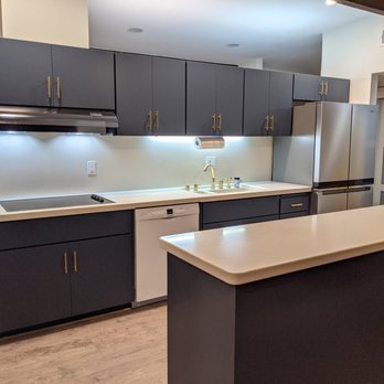Express Reface - Love the sleek look of the flat doors & drawers, goes well with our mid-century modern home. - Cabinetry Near Me - Sacramento, California