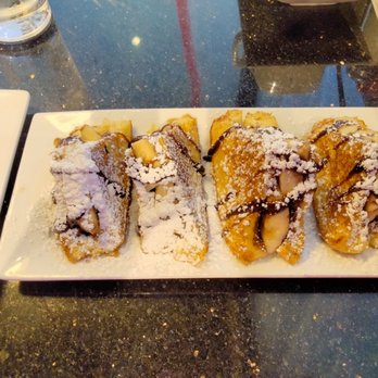 Keke's Breakfast Cafe - Nutella and Banana stuffed French Toast with Sausages as a side. - Breakfast & Brunch Near Me - Tampa, Florida