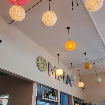 Omma - a view of a restaurant with colorful paper lanterns hanging from the ceiling - Korean Near Me - Montreal, Quebec Omma - a view of a restaurant with colorful paper lanterns hanging from the ceiling - Korean Near Me - Montreal, Quebec