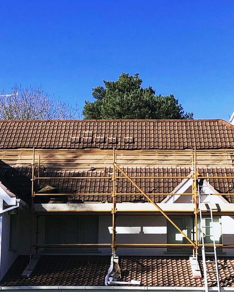 Slide of Tobin Hill Roofing