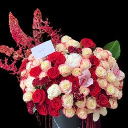 Amore Dolce Flowers - Custom black hat box with Ecuadorian roses, bells of Ireland, spray roses, and assorted mixed flowers