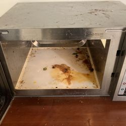 Husky Union Building - Disgusting interior of microwave.