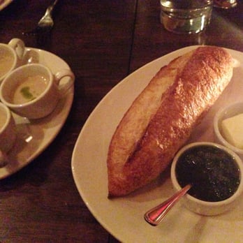 Ox - bread and chimichurri with amuse bouche of soup. - Argentine Near Me - Portland, Oregon Ox - bread and chimichurri with amuse bouche of soup. - Argentine Near Me - Portland, Oregon