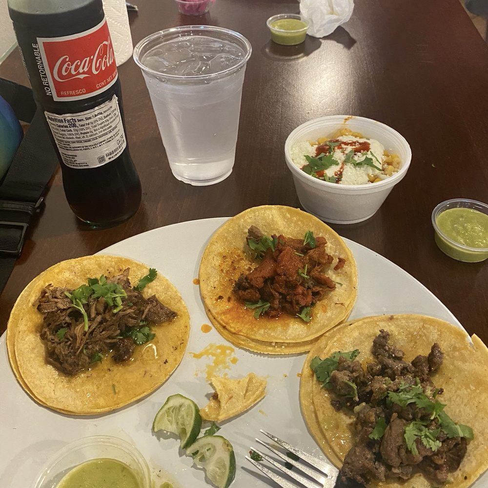 Los Guapos - Brisket, Pastor, Barbacoa, Elote at top right with a Mexican Coke - Mexican Near Me - Fort Worth, Texas