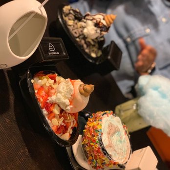 Poop Cafe - a man eating a piece of cake and a piece of ice cream - Desserts Near Me - Toronto, Ontario