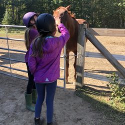 Two KBH students patting Hank after their lesson! Hank absolutely loved having their attention!