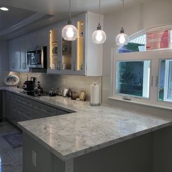 Elegant Improvement - KitchenAfter2- New Window and Peninsula - Flooring Near Me - Irvine, California
