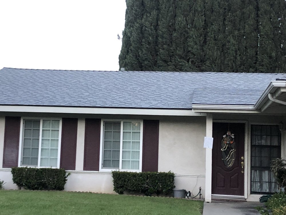 Slide of De Lorenzo's Guaranteed Roofing