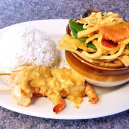 a plate of food and a bowl of rice