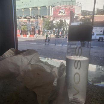 BoSa Donuts - a bottle of water on a table - Bakeries Near Me - Phoenix, Arizona