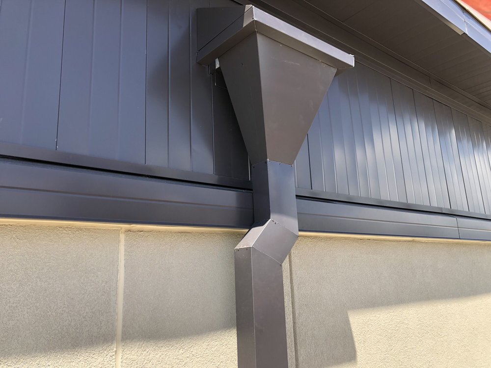 Slide of Regan Roofing