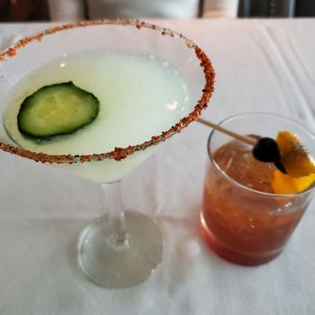 Silo Elevated Cuisine & Bar - L Cucumber Martini, R Burnt Old Fashioned!! - New American Near Me - San Antonio, Texas Silo Elevated Cuisine & Bar - L Cucumber Martini, R Burnt Old Fashioned!! - New American Near Me - San Antonio, Texas